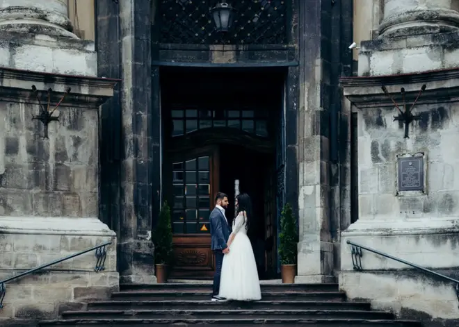 Couple exchanging vows during a courthouse wedding ceremony with a judge officiating