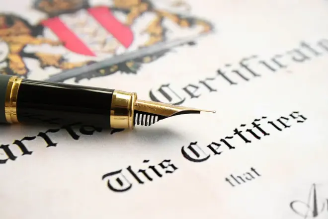 A couple reviewing marriage license paperwork at a Georgia probate court counter